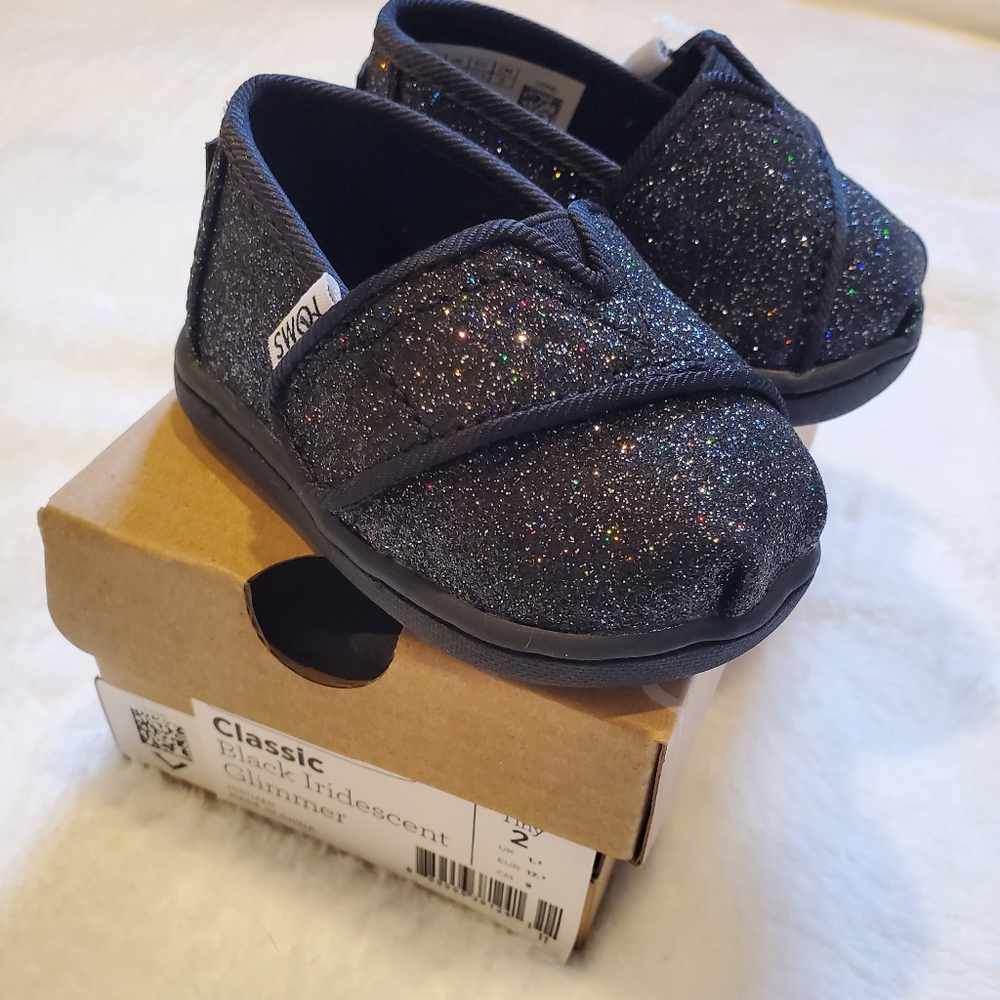 Tom's tiny shoes